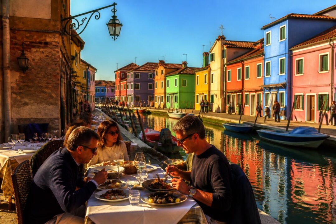 scopri dove mangiare a burano con la nostra guida alle migliori trattorie di pesce dell'isola, tra storia autentica e indirizzi attuali per un'esperienza culinaria unica.